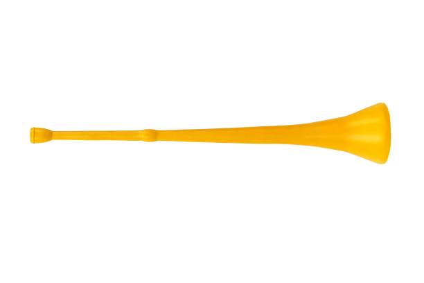 Vuvuzela on white Yellow vuvuzela horn isolated on white background vuvuzela stock pictures, royalty-free photos & images