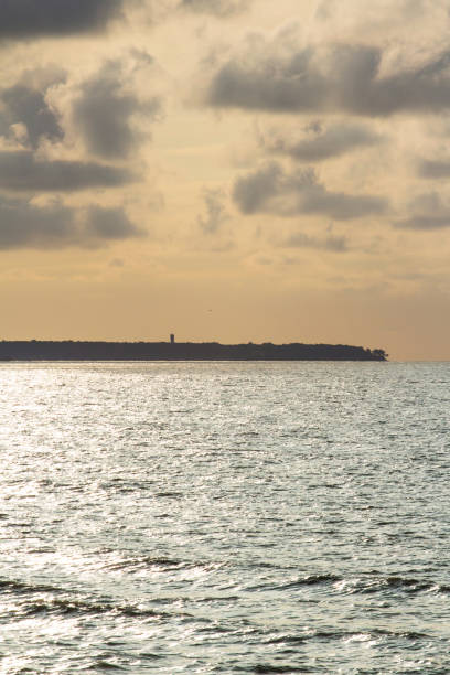 istock The coastline and the sea at sunset 1084219568