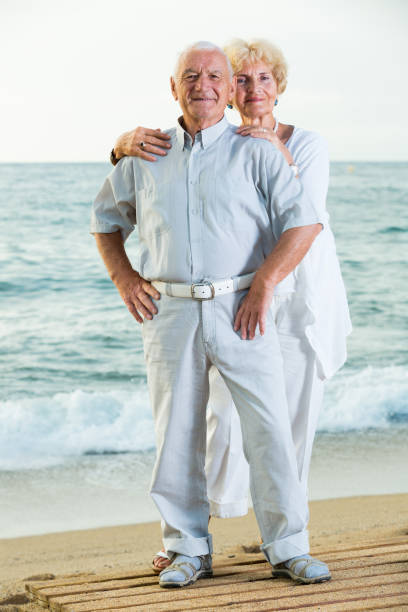 istock pensioners standing together on the sea coast 1084221008