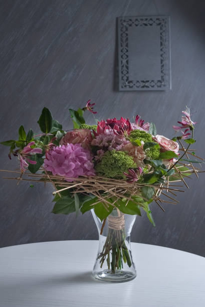 istock beautiful modern wedding bouquet on white table. Selective focus 1084221916