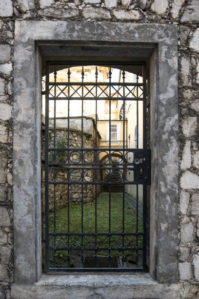 istock Old forged metal grating in old Europe 1084229162