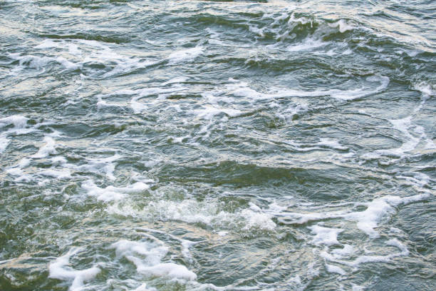 istock ripples on the water after the ship background texture 1084229544