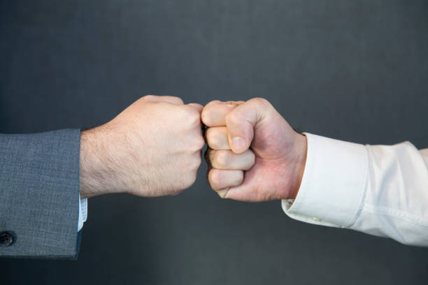 istock Two confident business man shaking hands during a meeting in the office, success, dealing, greeting and partner concept. 1084241842