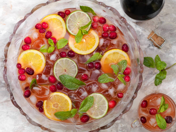 Sparkling Punch Sparkling Punch with Cranberry's, Oranges, Lemon and Limes punch drink stock pictures, royalty-free photos & images