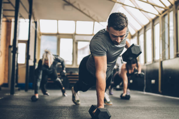 istock Personal Weight Training In The Gym 1084252298