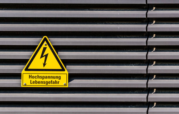 istock Close-Up Of High Voltage Sign On Wall 1084256656