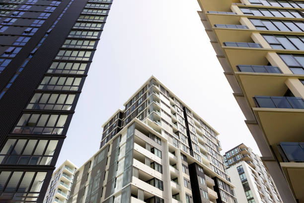 istock New high rise apartment buildings, sky background with copy space 1084264768