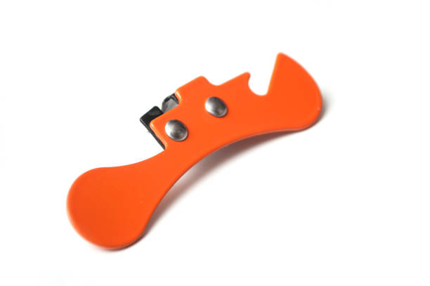 istock orange can opener on white background 1084266926