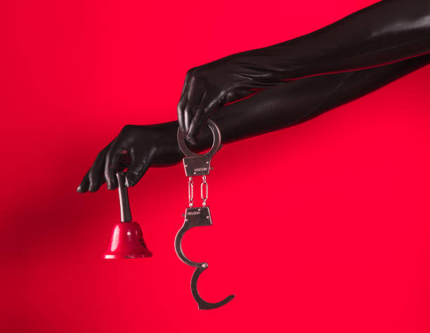 istock handcuffed fetish hands in latex 1084269038