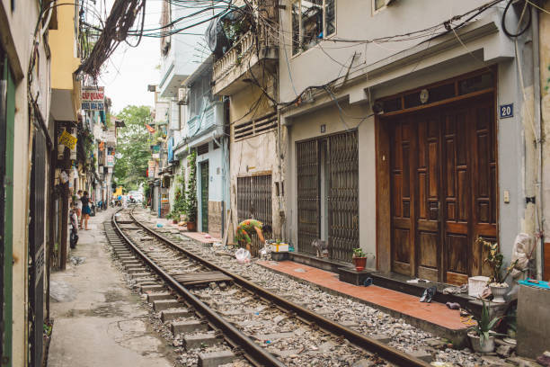 istock Railroad Track By Building In City 1084278610