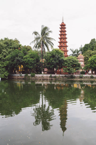 istock Temple By Lake Against Sky 1084279738