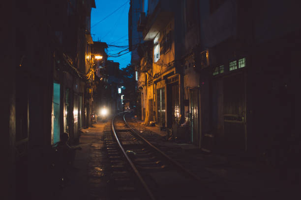 istock Railroad Tracks Amidst Buildings In City 1084279934