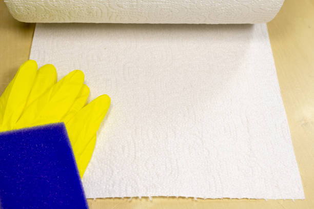 istock Sponge and liquid for cleaning the surface at home. Accessories for keeping household clean. Light background. 1084282956