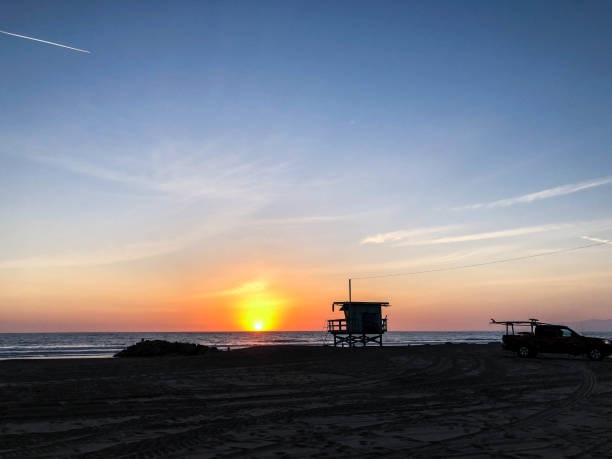 istock Sunset on the beach in Venice, CA over the Pacific Ocean 1084286836