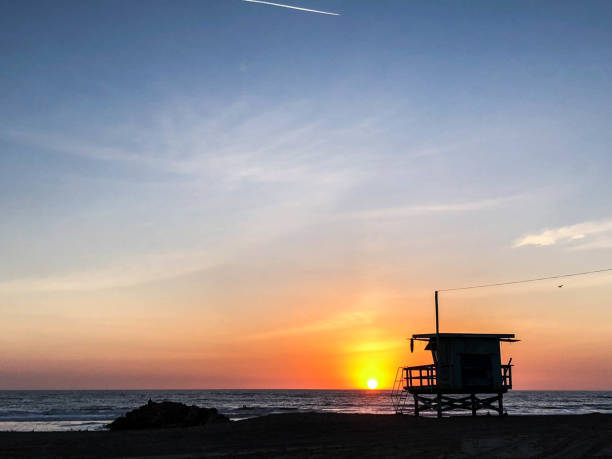 istock Sunset on the beach in Venice, CA over the Pacific Ocean 1084286854