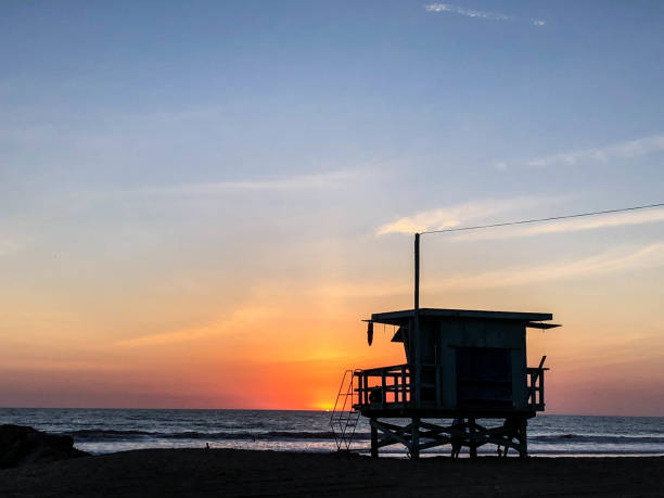 istock Sunset on the beach in Venice, CA over the Pacific Ocean 1084286856