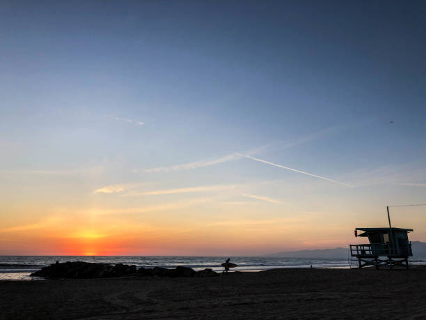 istock Sunset on the beach in Venice, CA over the Pacific Ocean 1084286870