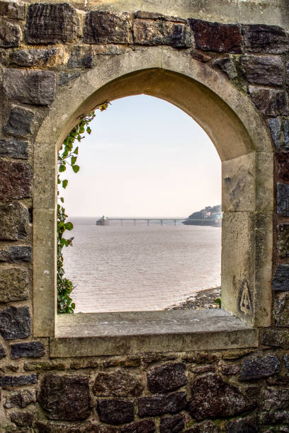 istock Clevedon Pier through the eye of an old viewing post. 1084295308