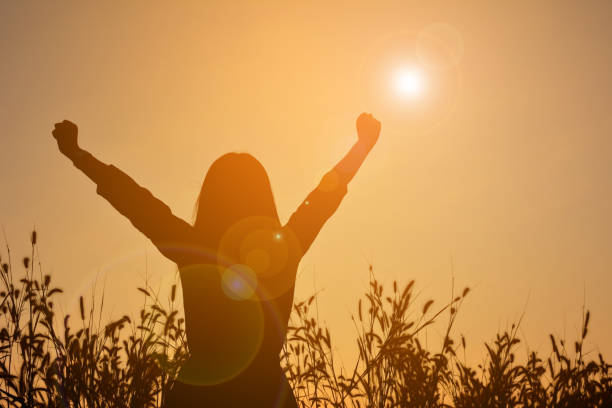 istock Silhouette Woman Against Sky During Sunset 1084306276