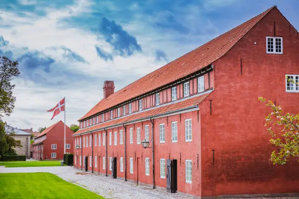 Red barrack in Kastellet, a star shaped fortress in the central part of the city, popular tourist place. Landmark in the old town