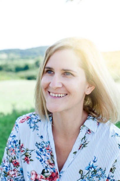 istock Smiling Woman Looking Away 1084312498