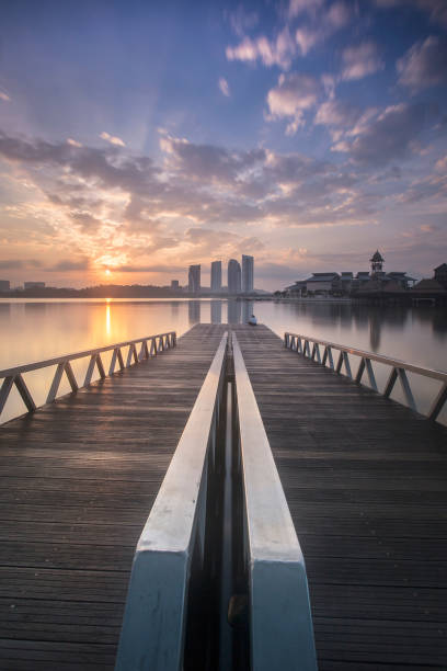 istock Pier Over Sea Against Sky During Sunset 1084314940