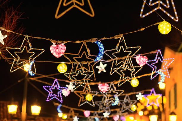 Christmas decoration lights to illuminate the night stock photo