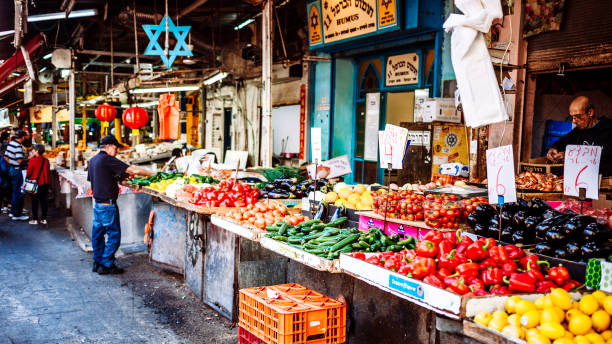 People shopping at Carmel Market in Tel Aviv, Israel