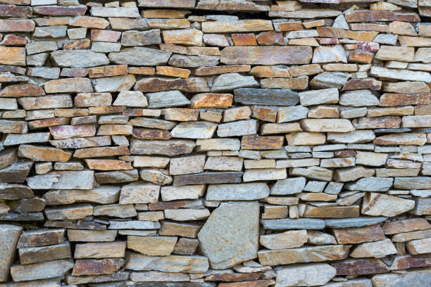 istock Detail of Medieval stone wall, background 1084322412