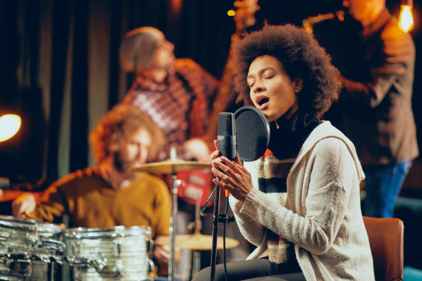 istock Mixed race woman singing. 1084322572