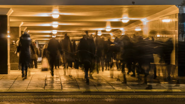 istock the flow of people in the underpass, 1084324780