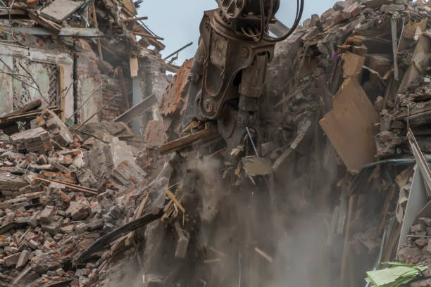 istock demolition of a multi-storey building with hydraulic shears, for future development of residential buildings 1084324794