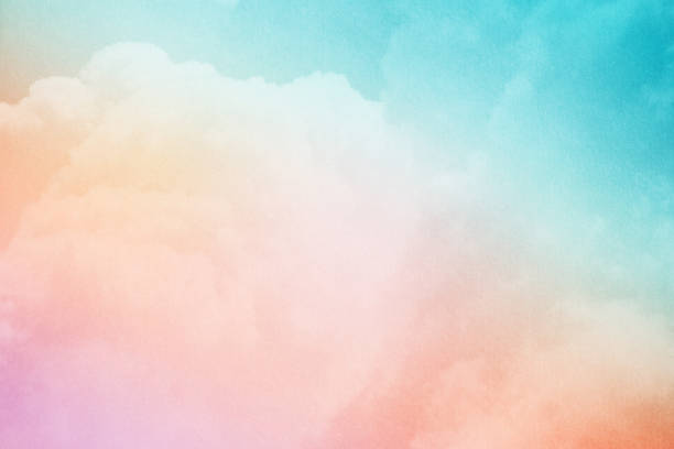 istock fantasy cloudy sky with pastel gradient color and grunge texture, nature abstract background 1084347864
