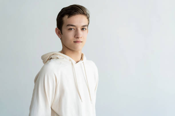 istock Confident handsome teen boy looking at camera 1084353468