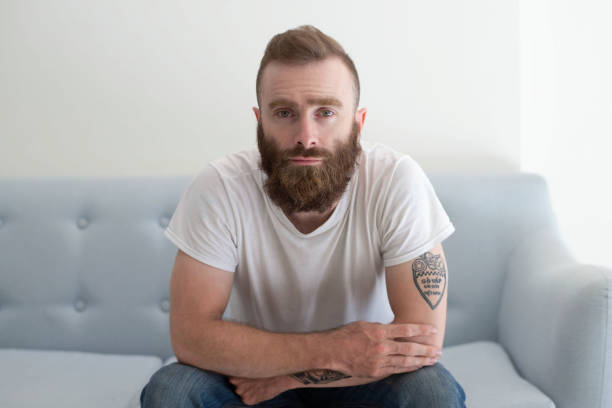 istock Serious pensive hipster waiting in lounge 1084353908