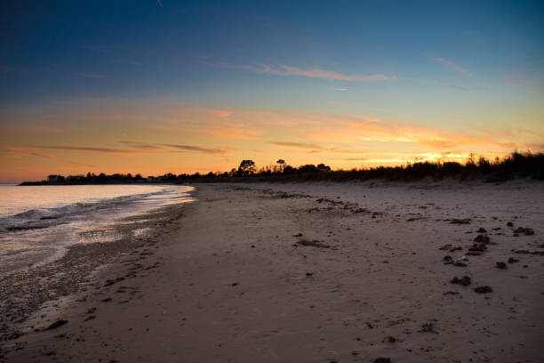 Norfolk Virginia, Beach Side Sunset Winter Sunset ocean beach and marsh hampton virginia photos stock pictures, royalty-free photos & images