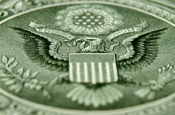 istock Close up of American eagle from dollar bill. 1084360340
