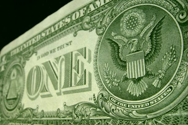 colpo di testa superficiale sul retro della fattura del dollaro usa. - paper currency usa number 1 bankruptcy foto e immagini stock