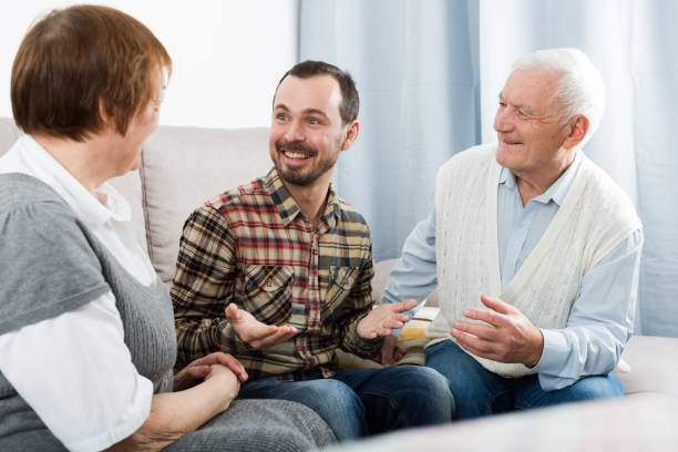 istock Grandparents and grandson talk 1084363626