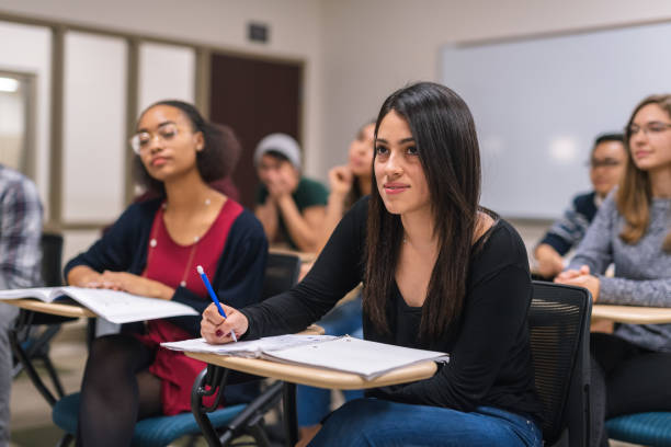 istock College students listening to a lecture in the classroom 1084365070
