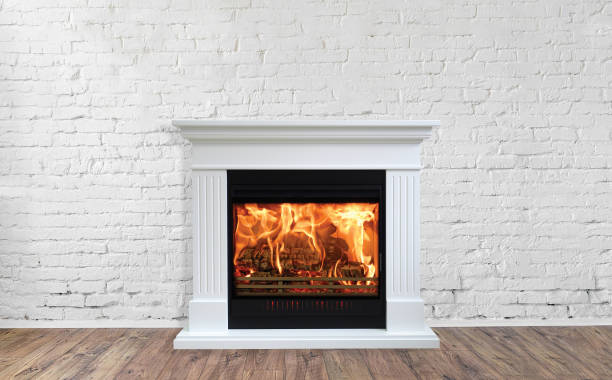 istock Fireplace in bright empty living room interior of house 1084372238