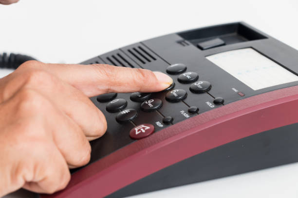 istock young women hands and dialing number 1084377510