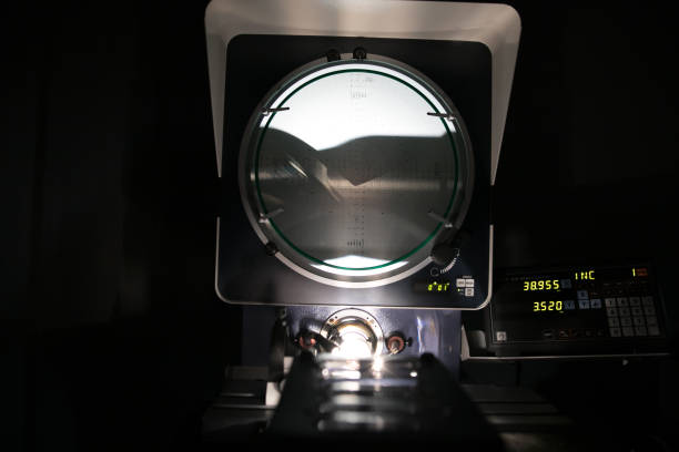 istock On the left is the drill under the microscope which is illuminated by LEDs. On the right is on the monitor displayed output of the microscope. 1084386654
