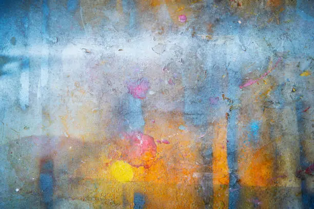 Photo of Abstract background from colorful painted on wall with grunge and scratched. Art retro and vintage backdrop.