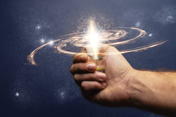 istock Businessman hand holding a light bulb with Innovative ideas. 1084399418