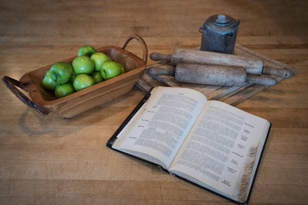 istock Still life of cookbook and apples 1084399536
