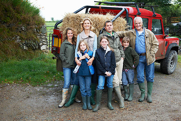 Family with 4x4 Landrover Devon, England farm photos stock pictures, royalty-free photos & images