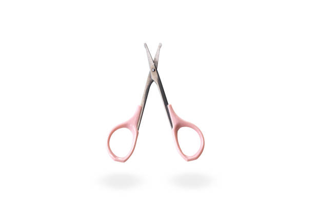 istock scissors trimming nose hair on isolated white background 1084417694