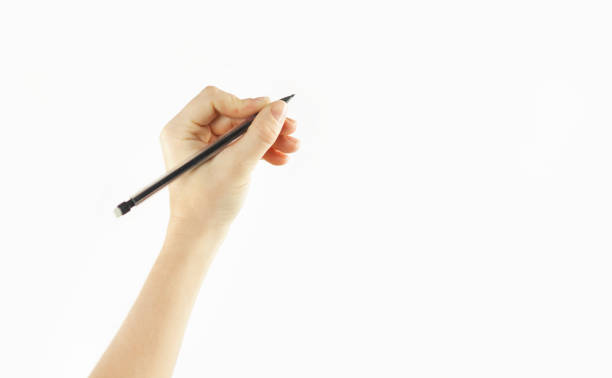 istock Girl's hand writes in empty space isolated on background 1084421840