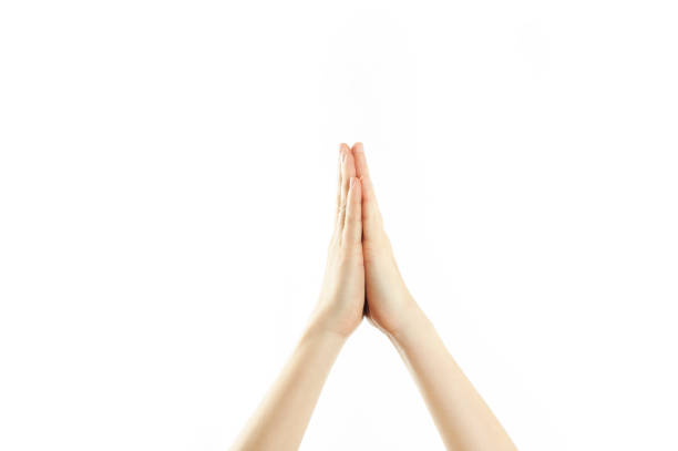 istock Close-up female tender hands on a white isolated background. Conventional labeling. 1084421864